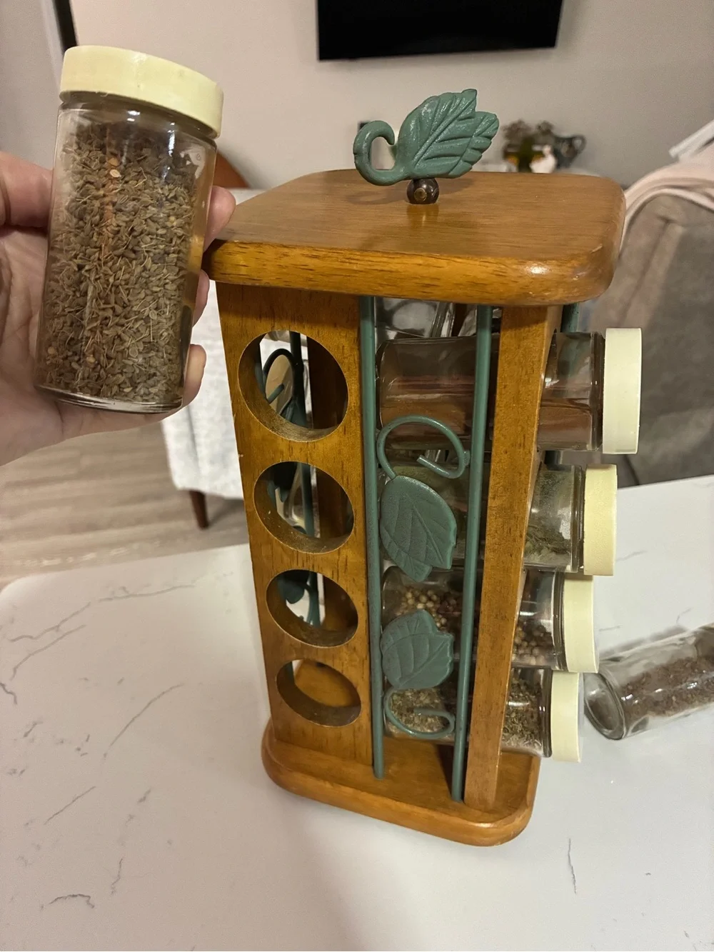 Vintage Wooden Rotating Spice Rack with Leaf Accents and White Lidded Jars